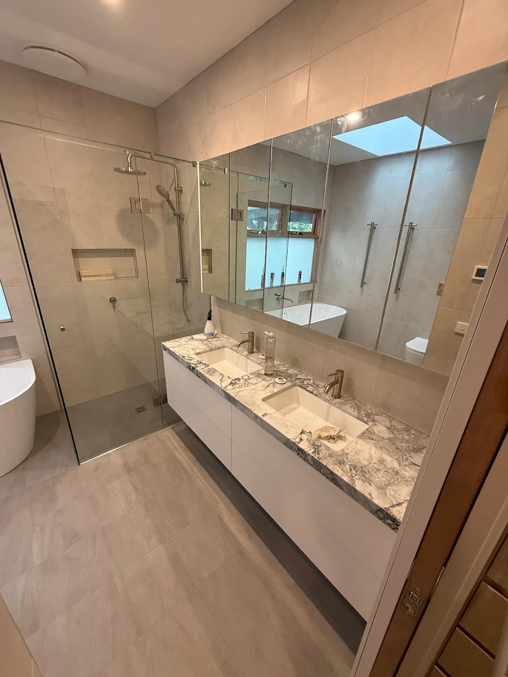 Finished vanity and sink in Yin Zhang's bathroom renovation